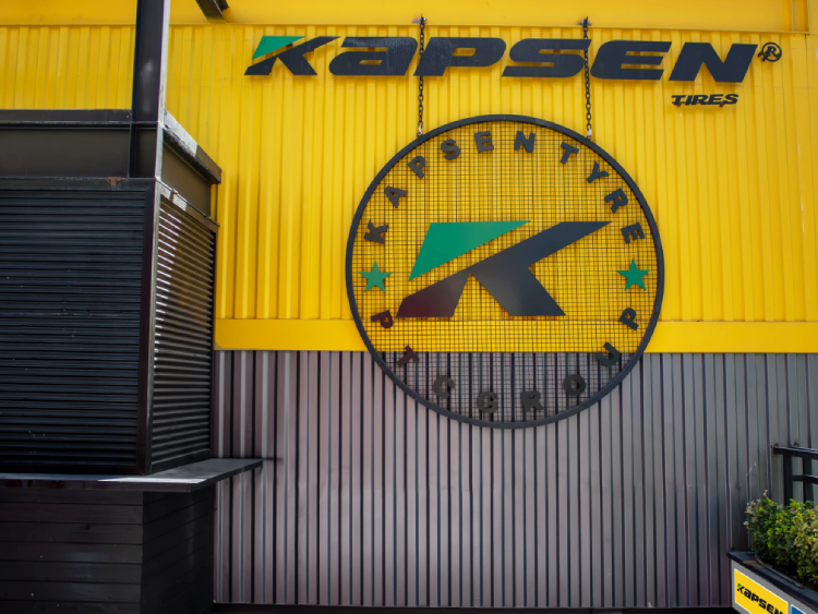 KAPSEN brand exterior designed by PTC GROUP, featuring the KAPSEN logo and signature yellow-black color scheme inspired by the brand’s visual identity