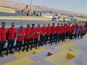 همکاران پی تی سی گروپ در کنار پیست مسابقه کارتینگ روتکس مکس سال 1402 در آیلند